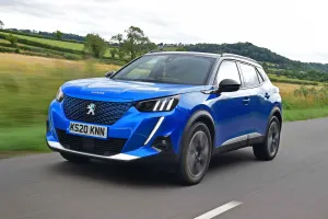 Tesla Model Y vs Peugeot e-2008: How They Stack Up – Expert Analysis on Features and Performance